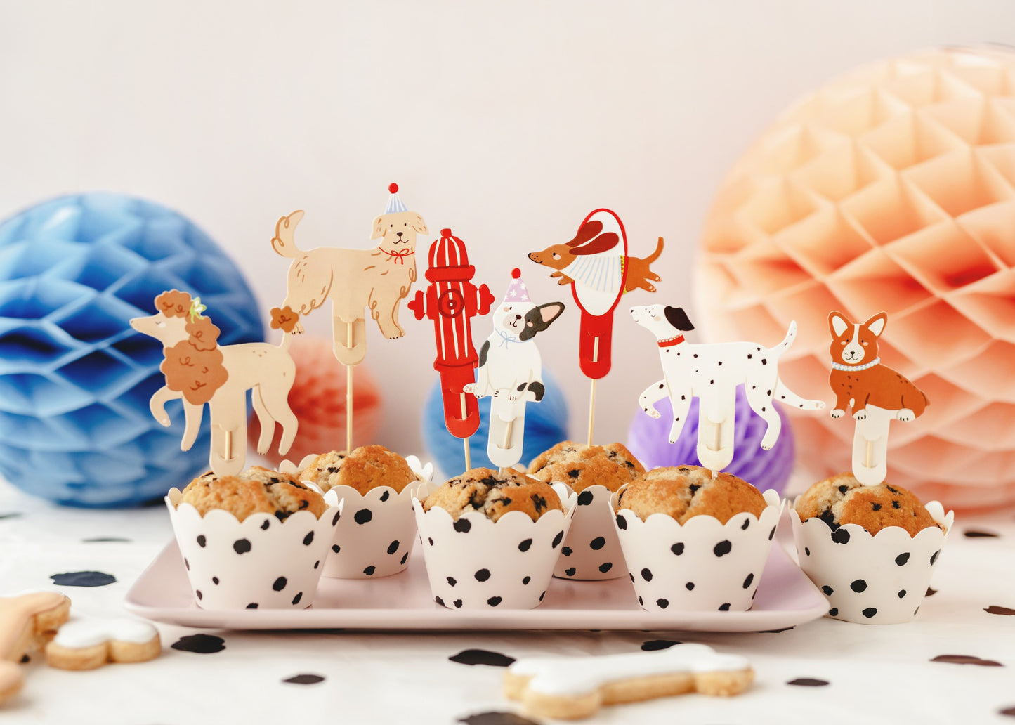 Set of assorted dog-themed cupcake toppers with cute dogs in party poses, ideal for decorating cupcakes and sweet treats at dog-themed parties