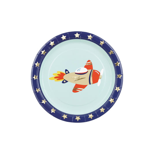 Round paper plate with a navy star border and a colorful rocket illustration in the center.
