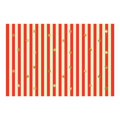 Red and beige striped tablecloth with small gold stars