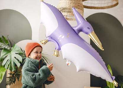 Purple Pterodactyl foil balloon for prehistoric kids party decorations