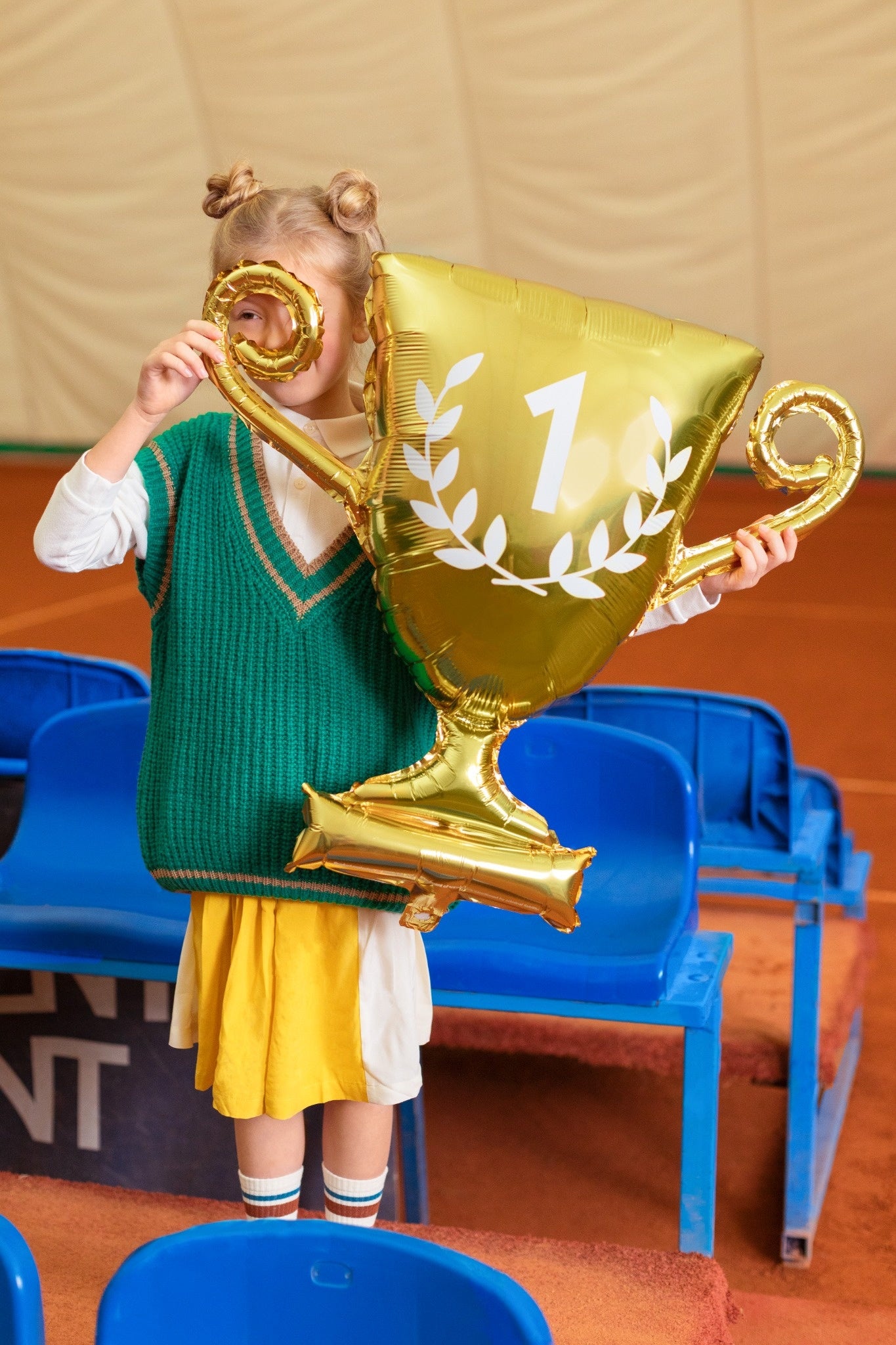 Gold foil balloon shaped like a trophy with number one design, perfect for football or sports birthday parties