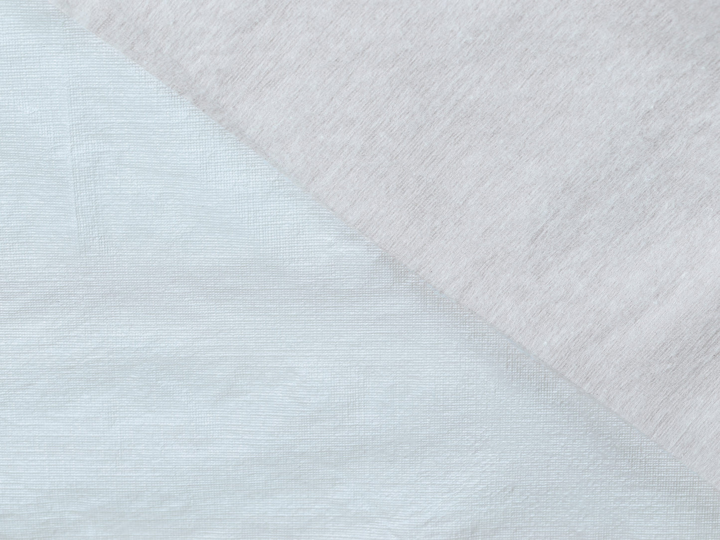 Close-up of textured fabric with a diagonal pattern