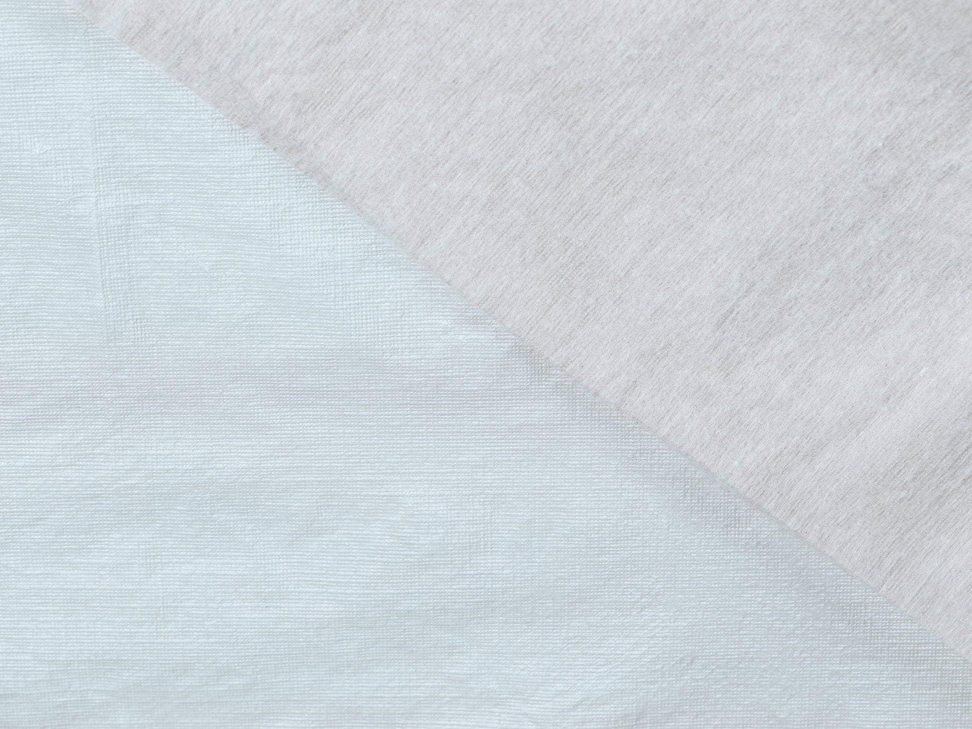 Close-up of textured fabric with a diagonal pattern