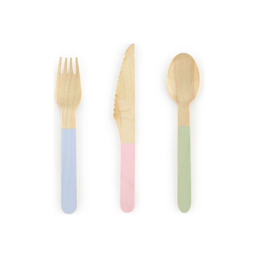 Set of wooden cutlery with pastel-colored handles on a white background
