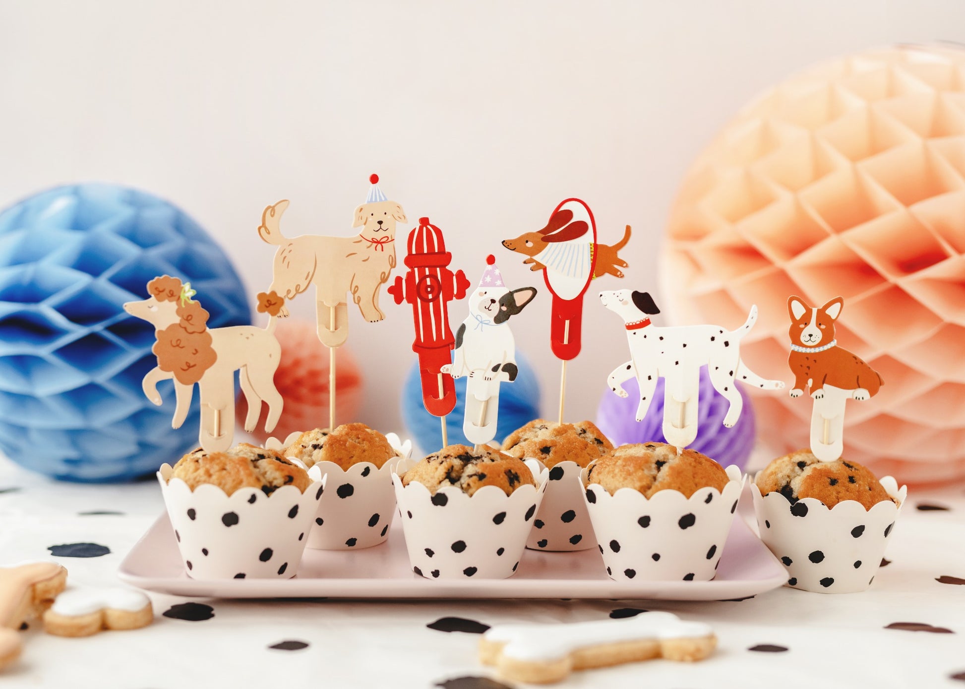 Set of assorted dog-themed cupcake toppers with cute dogs in party poses, ideal for decorating cupcakes and sweet treats at dog-themed parties