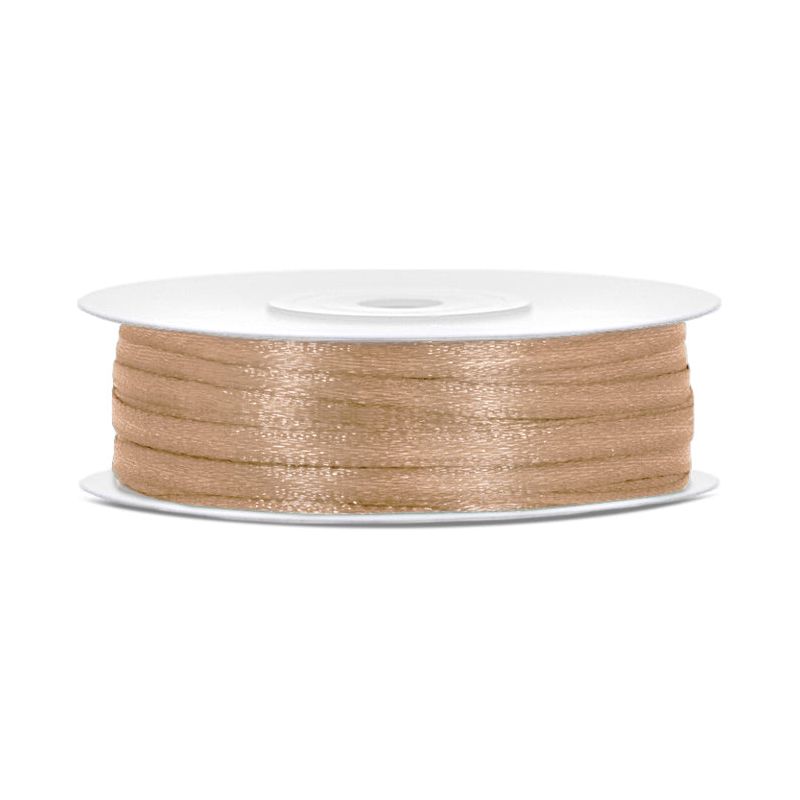 Spool of gold thread on a white background