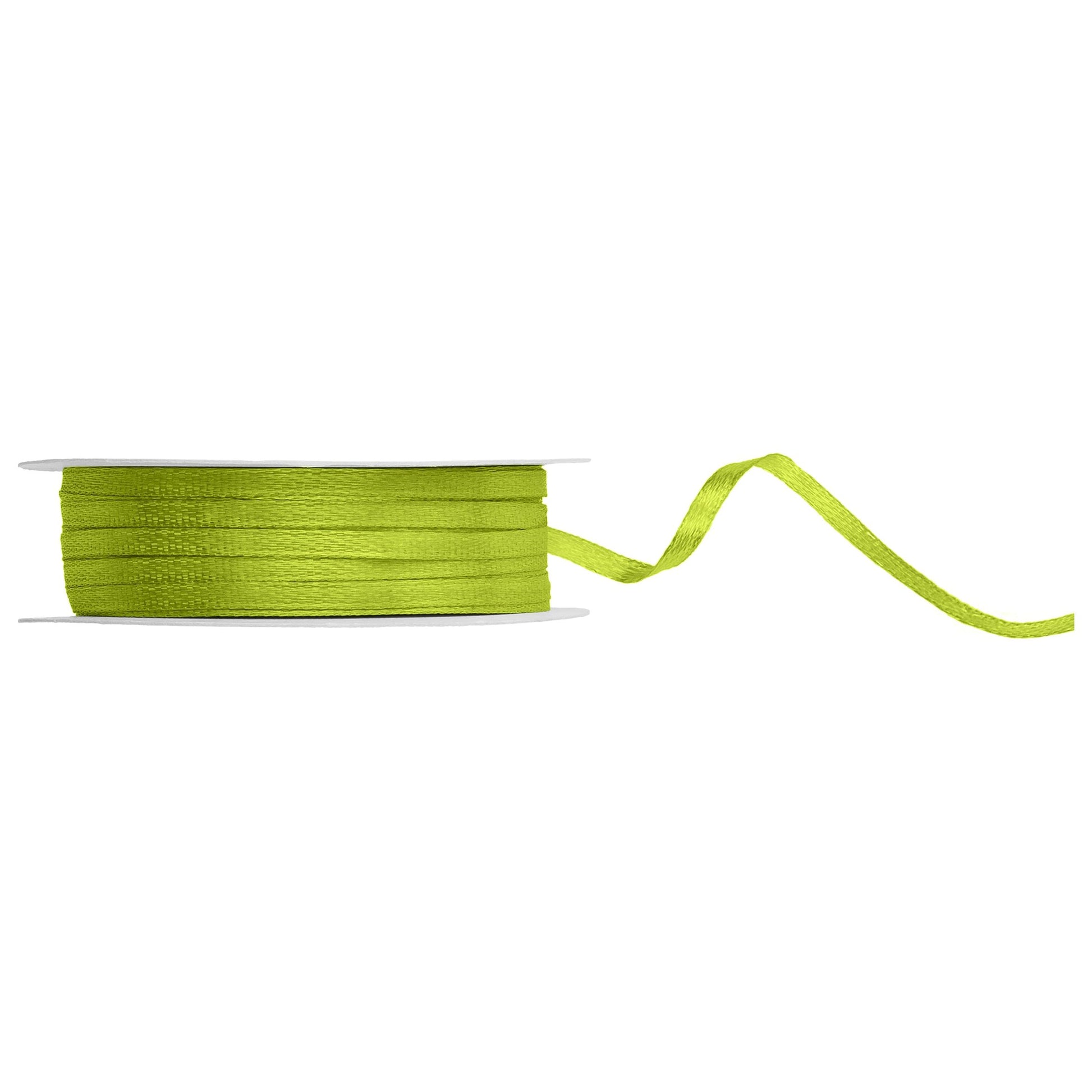 Spool of green apple ribbon on a white background