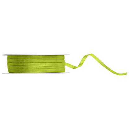 Spool of green apple ribbon on a white background