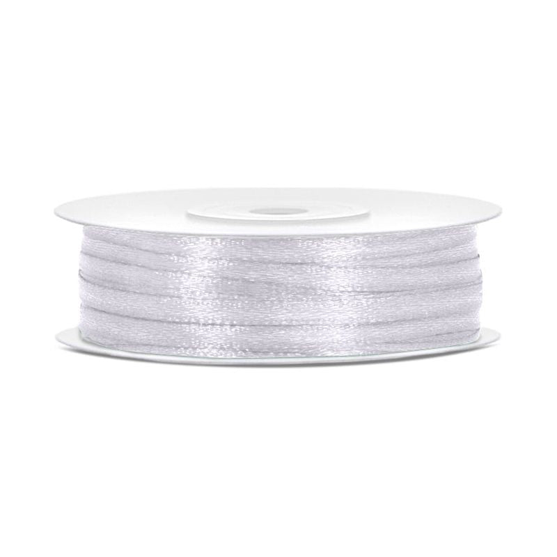 Spool of white thread on a white background