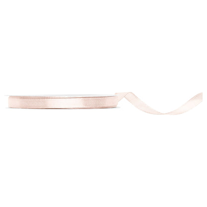Off-white satin ribbon on a white background