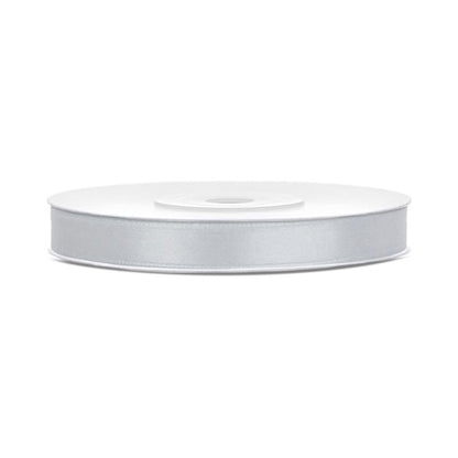 Silver ribbon spool on a white background