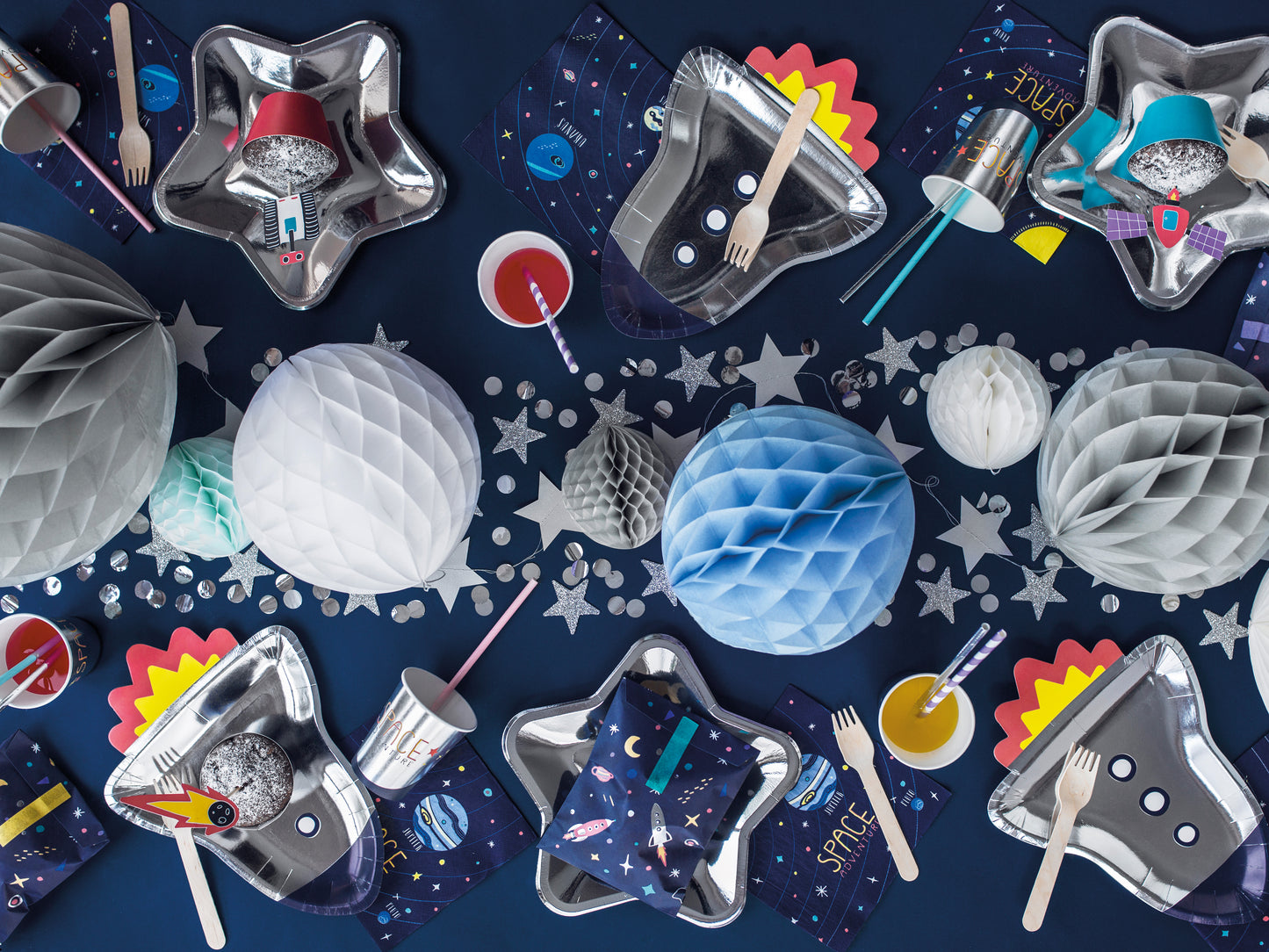 Rocket-shaped silver paper plate, perfect for space-themed kids party.