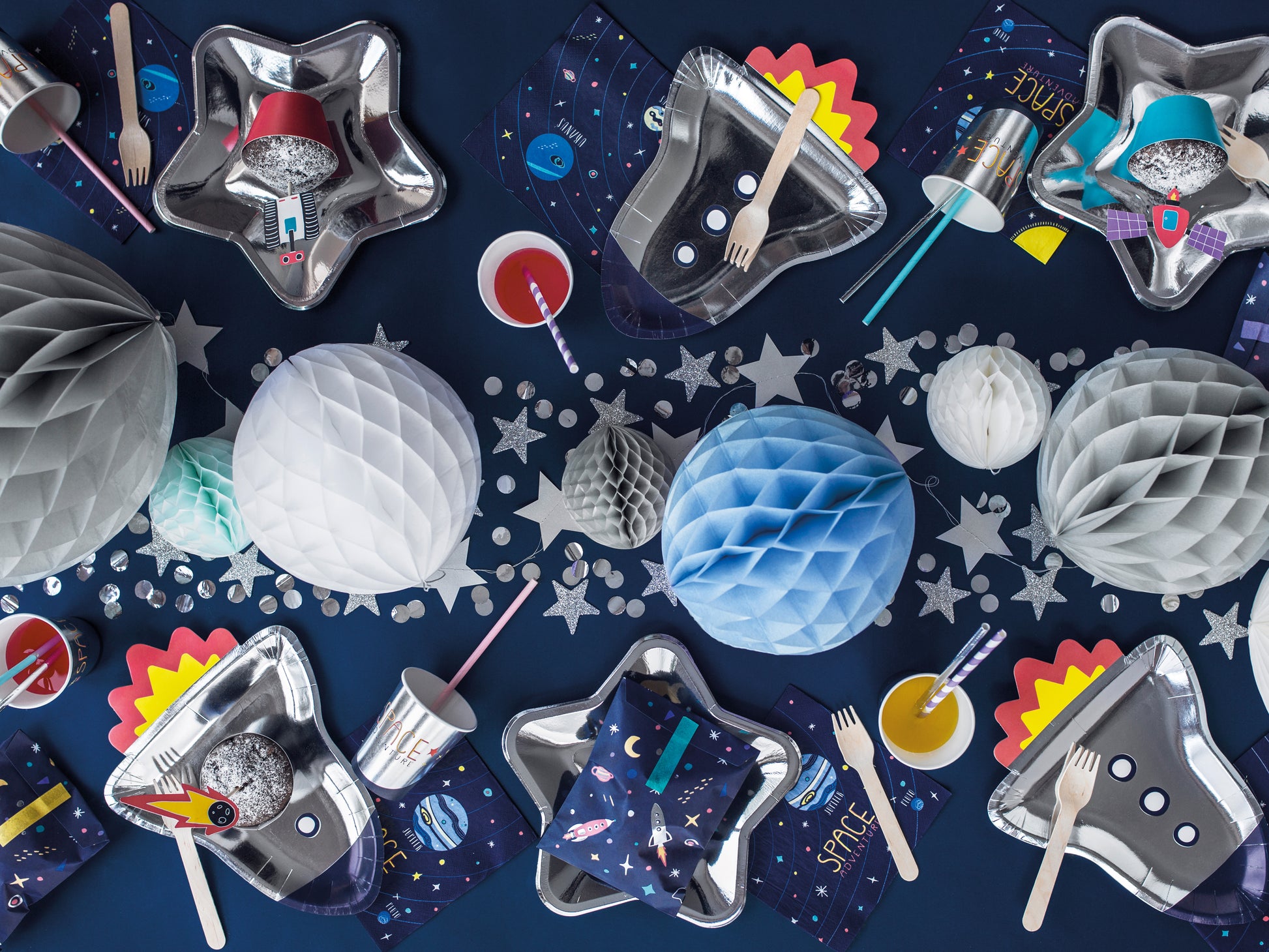 Rocket-shaped silver paper plate, perfect for space-themed kids party.