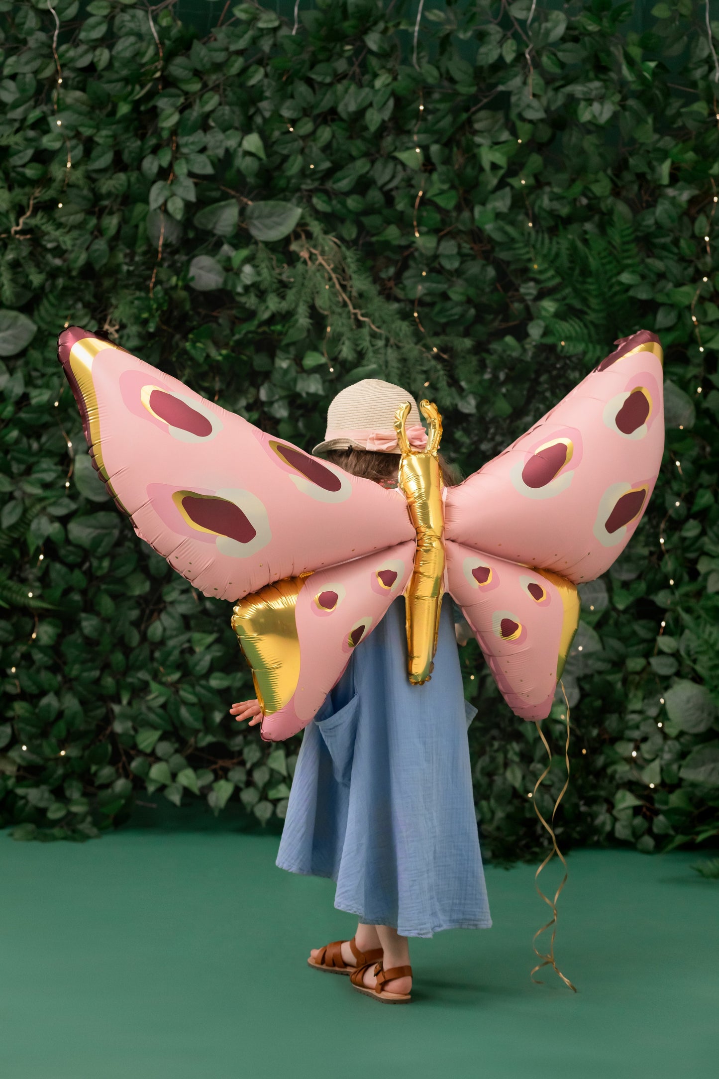 Pink butterfly foil balloon for unicorn birthday party decoration