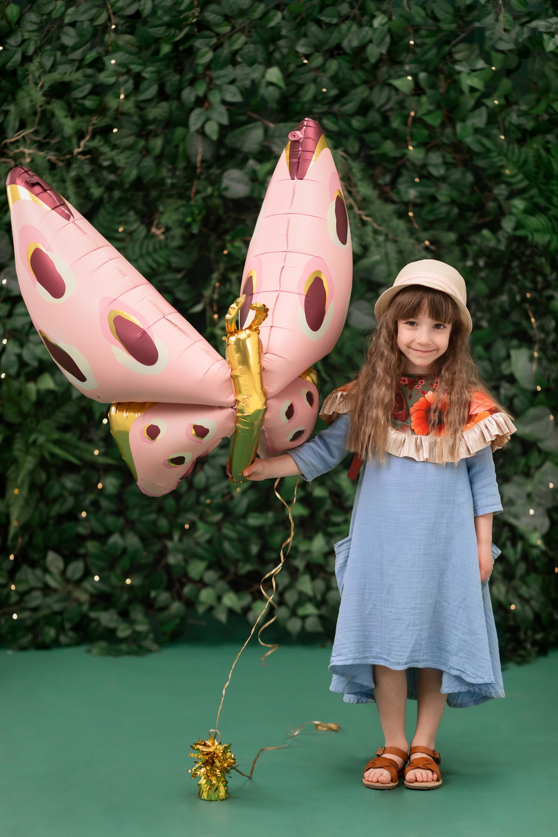 Pink butterfly foil balloon for unicorn birthday party decoration
