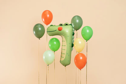 Crocodile-shaped number 7 foil balloon for wild animal party decor